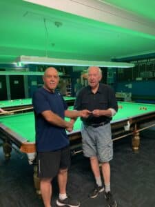 Ian Thomas presenting John Berry with his winnings